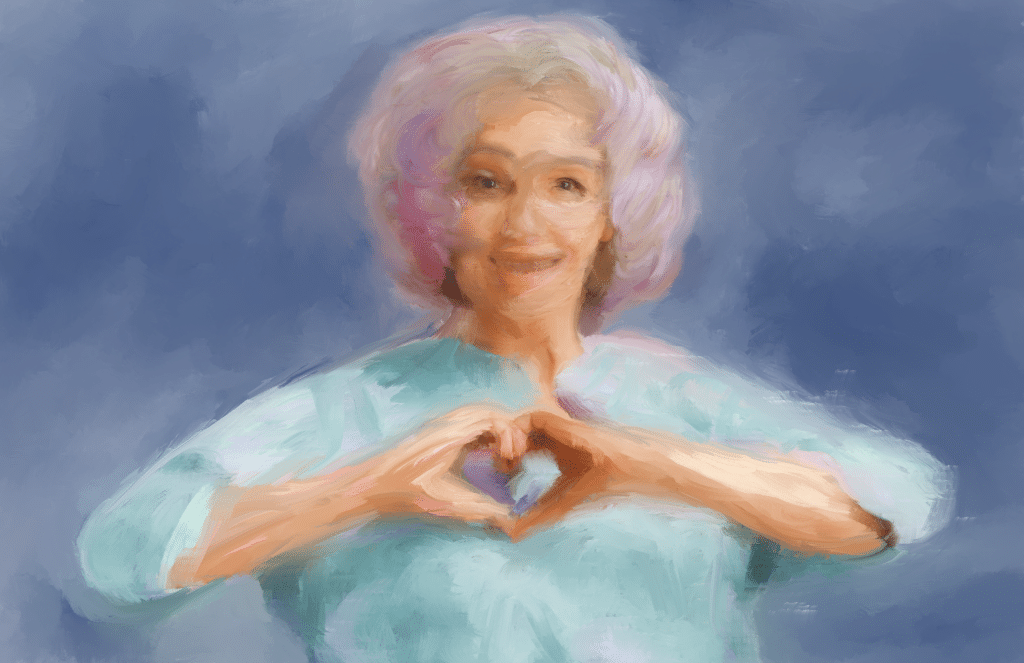 Ältere Frau mit Herzzeichen